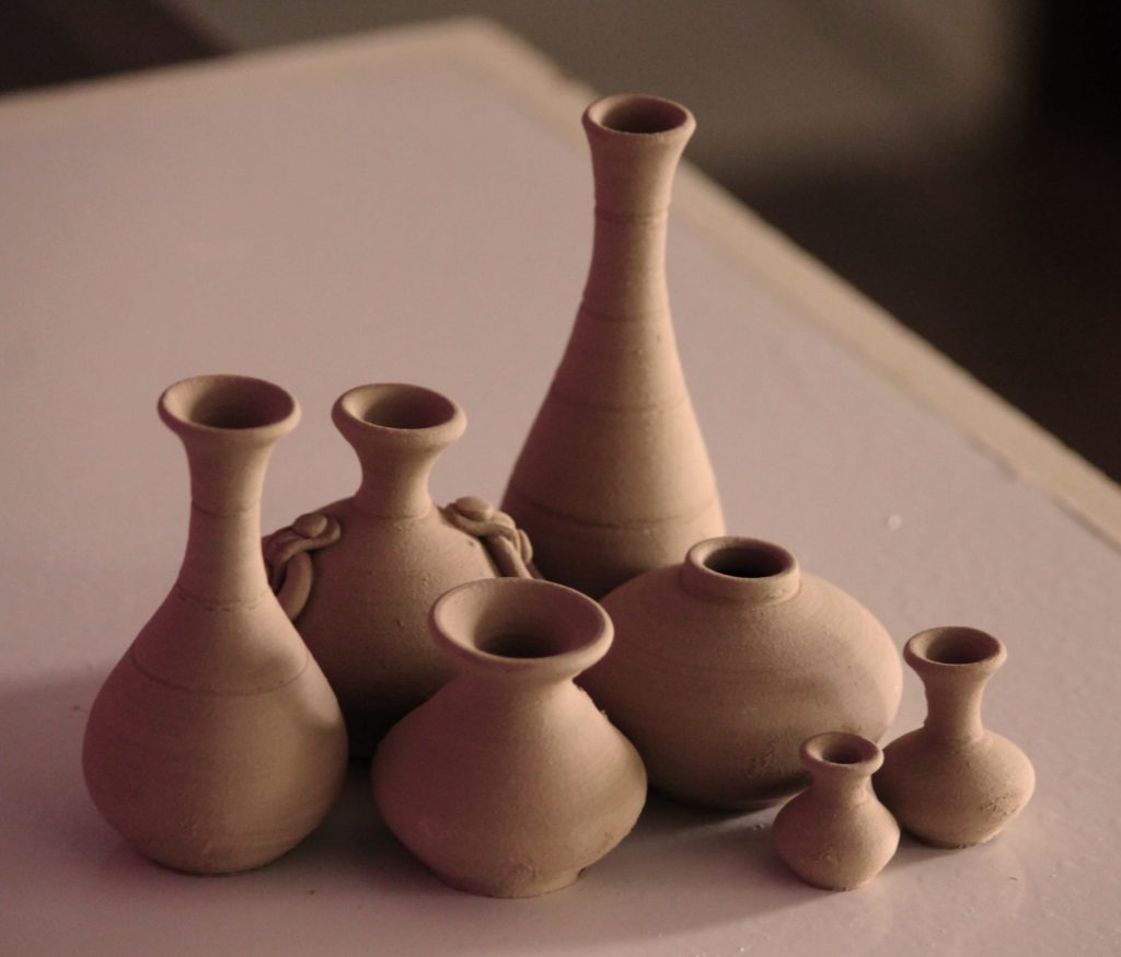 Clay jars of assorted sizes